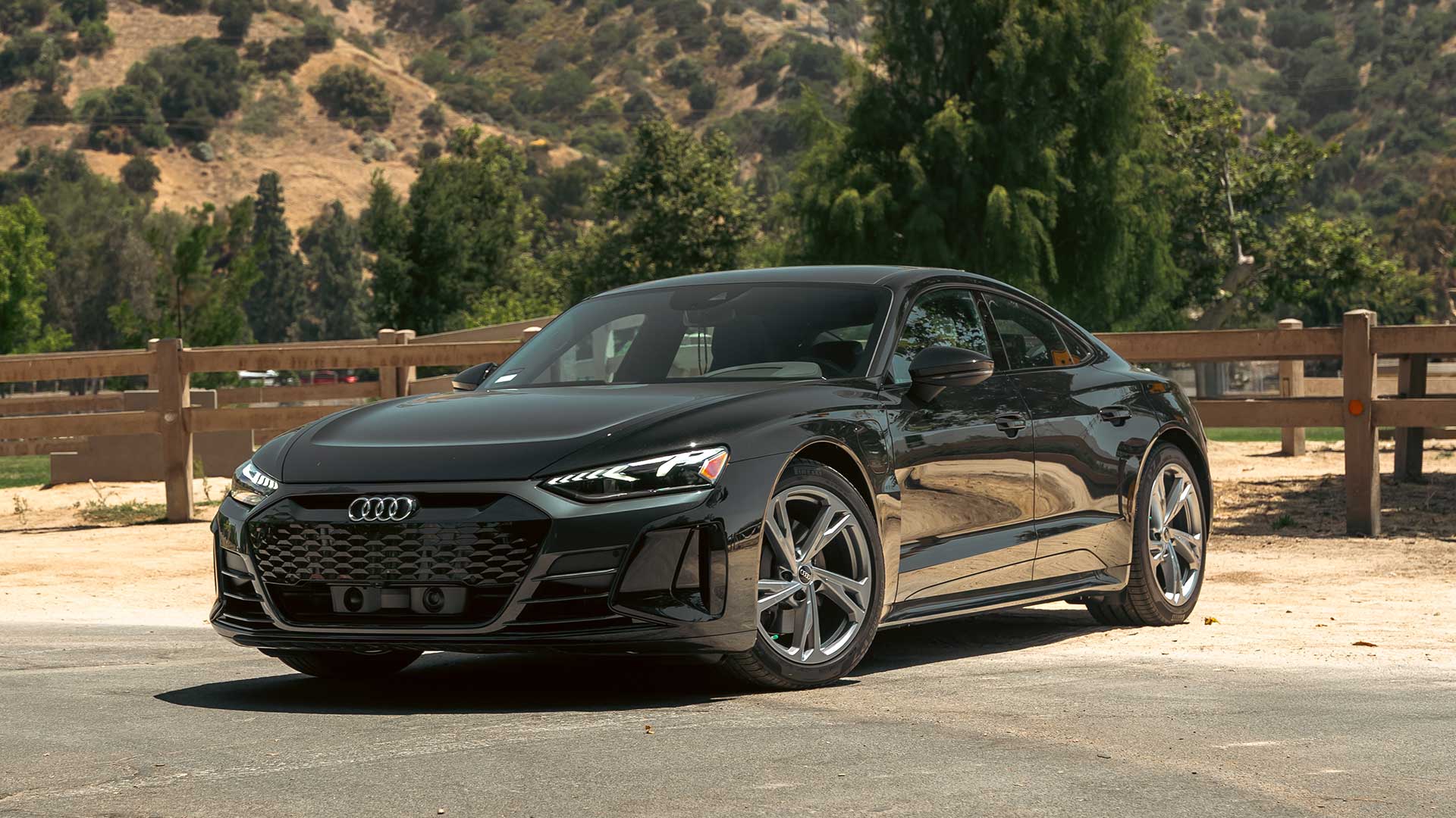 black audi e-tron gt electric sedan parked outdoors for car leasing guide 2025