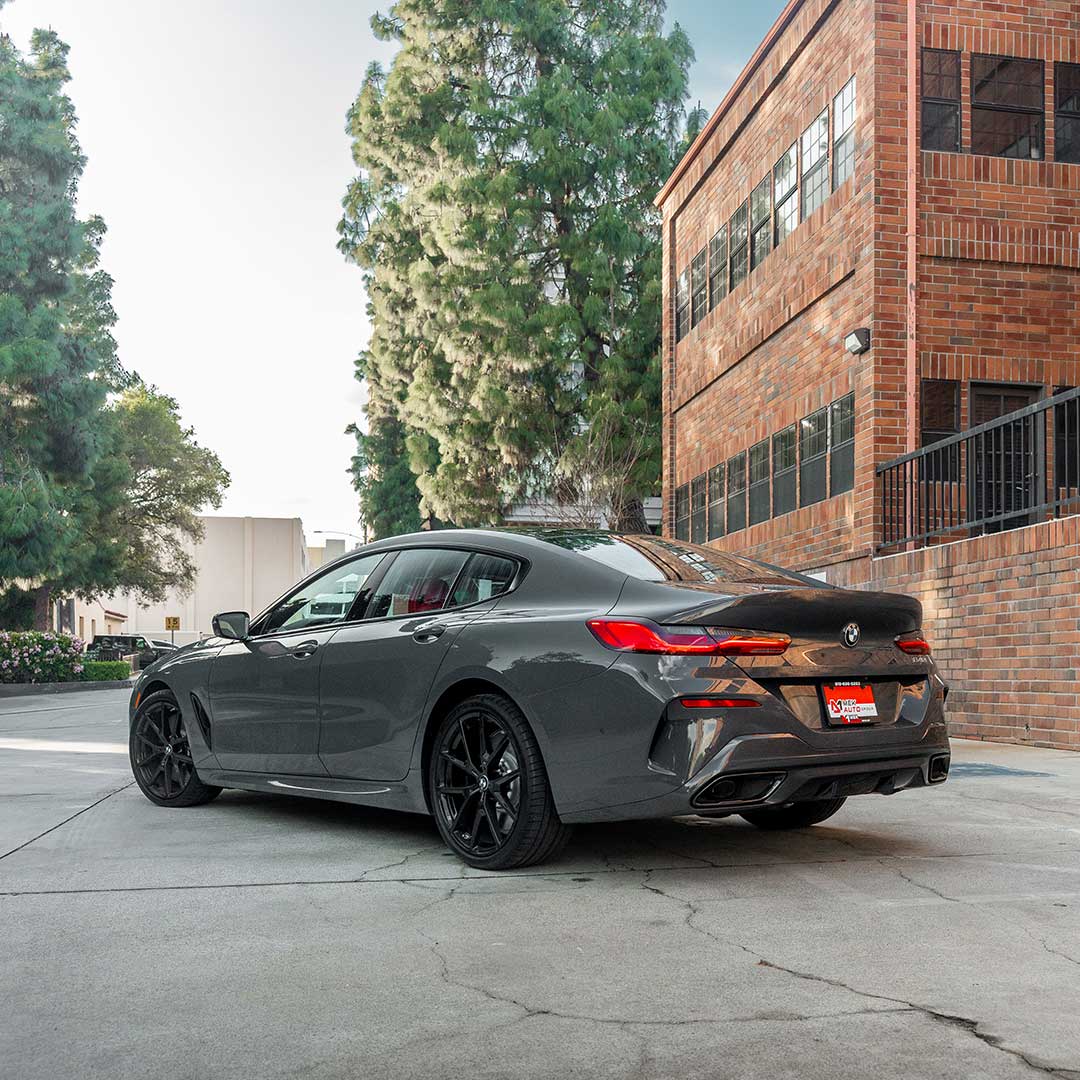 dark gray bmw 8 series gran coupe sedan for car leasing guide 2025