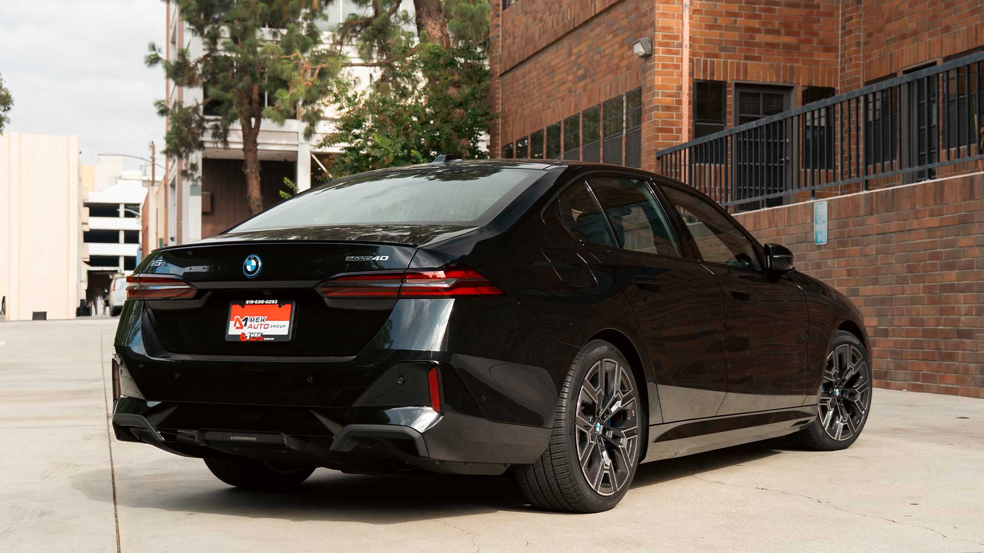 bmw i5 lease deal with mek auto group dealer plate
